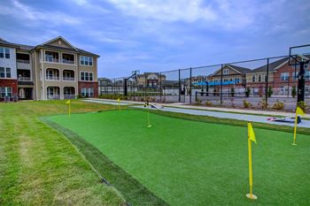 Lawn Game Pavilion with Putting Green, Bocce Courts, Cornhole Boards, and Shuffleboard